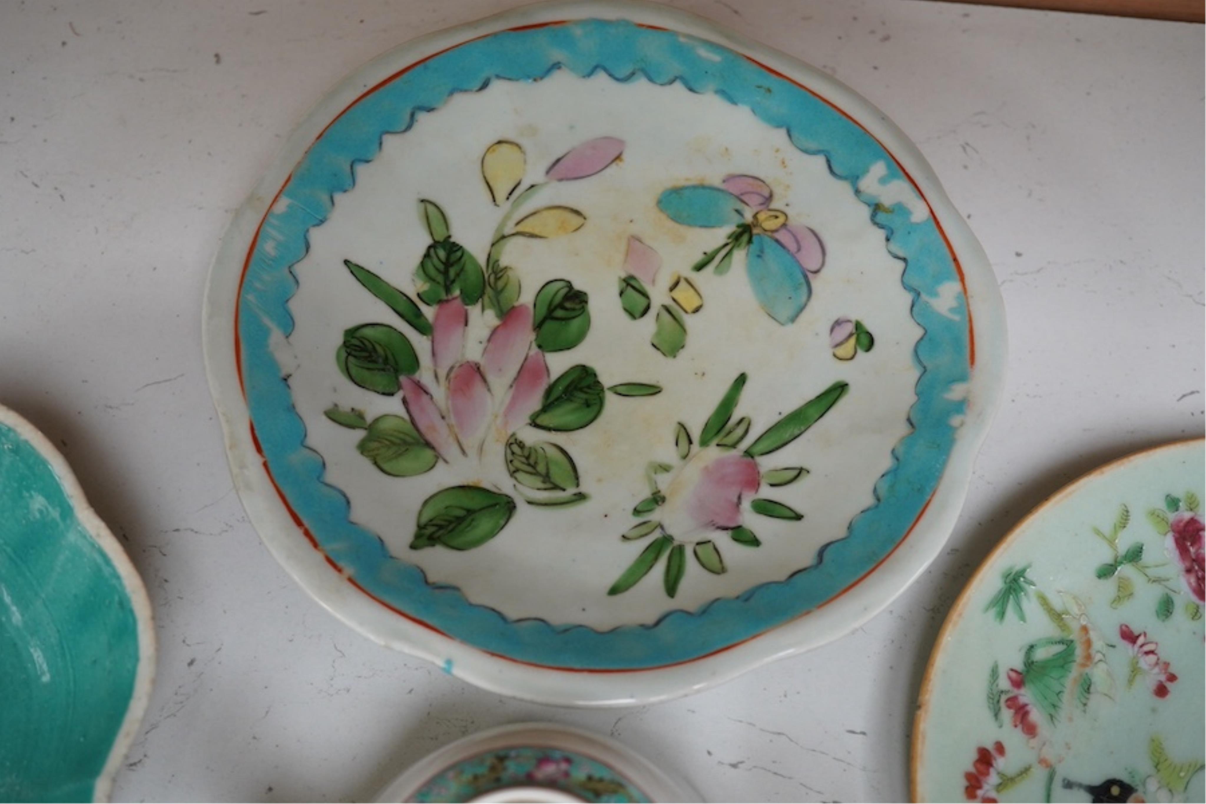 Three Chinese famille rose dishes, late Qing and a famille rose teapot, highest dish 5cm. Condition - fine chip to plate